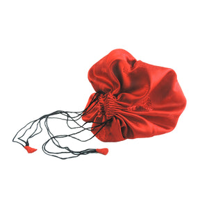 Roter Beutel mit Shou-Symbol